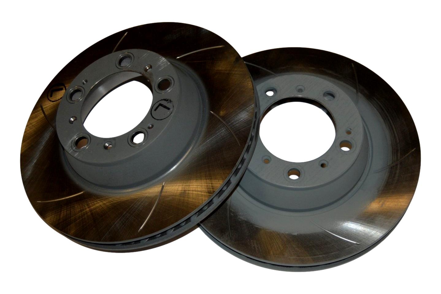 Slotted Brake Rotors - High-quality German rotor blanks with deep slots for improved durability and performance. Zinc coated. Sold as a pair. Replaces part numbers 996.352.405.00 and 996.352.406.00. Size: 330x28mm. Fits the rear of the 996 GT3 Cup.